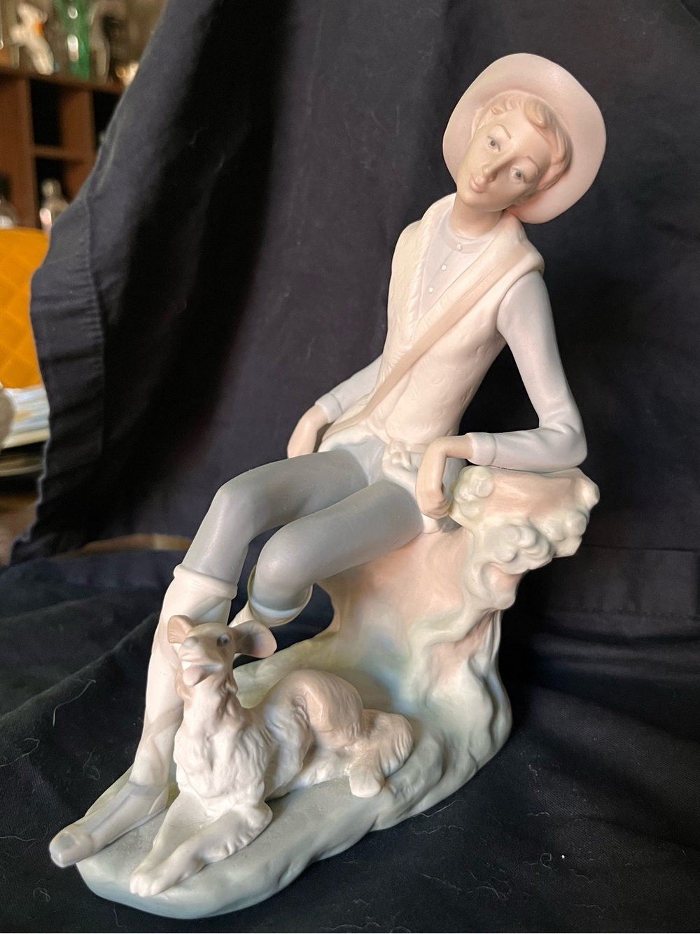 Lladró Porcelain Figurine “Seated Man with Dog”, matte, #4659